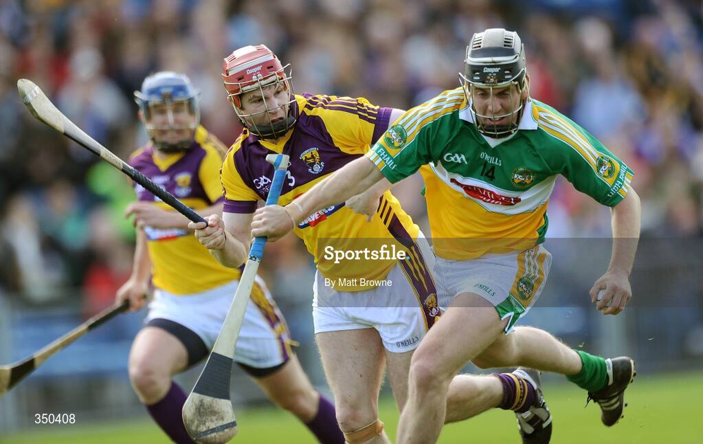 3 May 2009; Shane Dooley, Offaly, in action against Paul Roche, Wexford. Allianz GAA NHL Division 2 Final, Wexford v Offaly, Semple Stadium, Thurles, Co. Tipperary. Picture credit: Matt Browne / SPORTSFILE