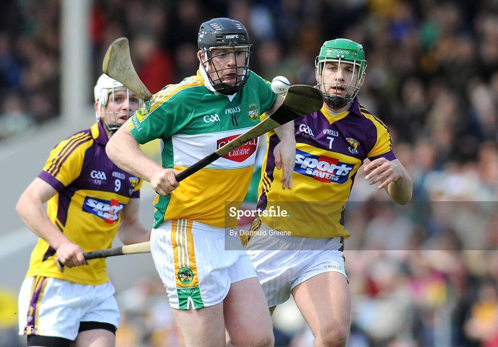 3 May 2009; Joe Brady, Offaly, in action against Ciaran Kenny, left, and Richie Kehoe, Wexford. Allianz GAA NHL Division 2 Final, Wexford v Offaly, Semple Stadium, Thurles, Co. Tipperary. Picture credit: Diarmuid Greene / SPORTSFILE