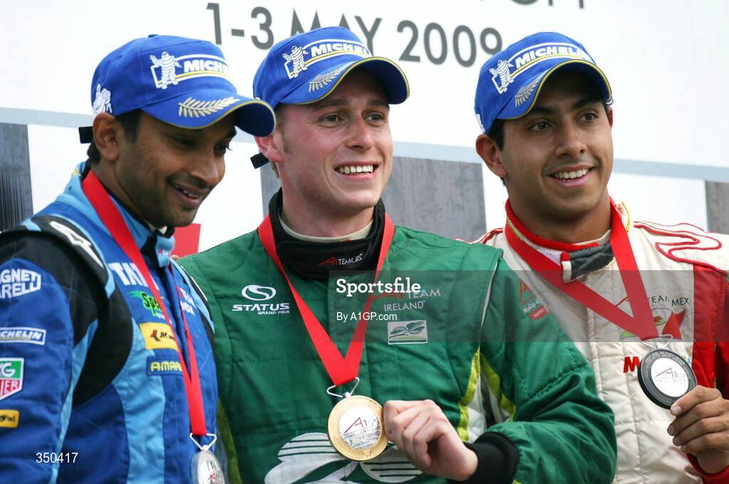 3 May 2009; Ireland’s Adam Carroll, centre, on the podium with Narain Karthikeyan, India, left, and Salvador Duran, Mexico, after winning the A1GP sprint race. A1GP Final Round, Brand’s Hatch, Fawkham, Longfield, Kent, England. Picture credit; A1GP.com / SPORTSFILE