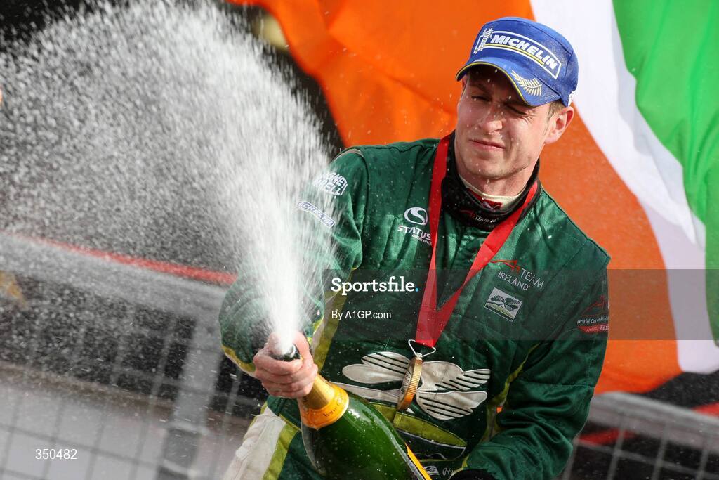 3 May 2009; Ireland’s Adam Carroll celebrates on the podium after winning the A1GP Brands Hatch Feature race and the A1GP World Cup of Motorsport Championship. A1GP Final Round, Brand’s Hatch, Fawkham, Longfield, Kent, England. Picture credit; A1GP.com / SPORTSFILE