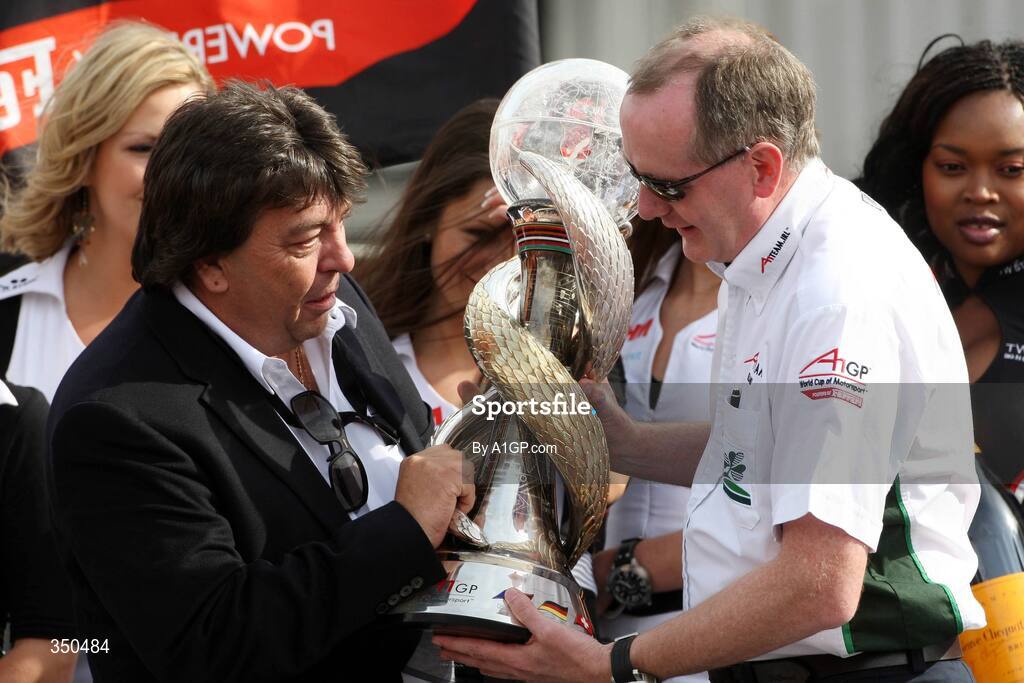3 May 2009; A1GP Chairman Tony Teixeira presents Mark Gallagher of A1 Team Ireland with the World Cup of Motorsport championship trophy. A1GP Final Round, Brand’s Hatch, Fawkham, Longfield, Kent, England. Picture credit; A1GP.com / SPORTSFILE