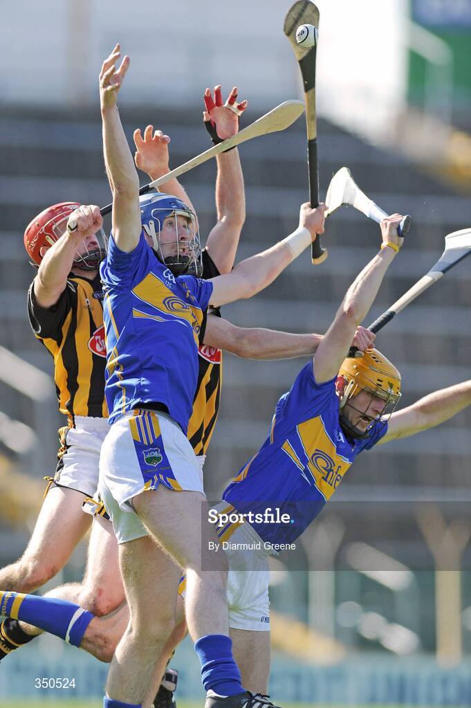 3 May 2009; John O'Brien, left, and Shane McGrath, Tipperary, in action against Tommy Walsh, left, and Michael Rice, Kilkenny. Allianz GAA NHL Division 1 Final, Kilkenny v Tipperary, Semple Stadium, Thurles, Co. Tipperary. Picture credit: Diarmuid Greene / SPORTSFILE
