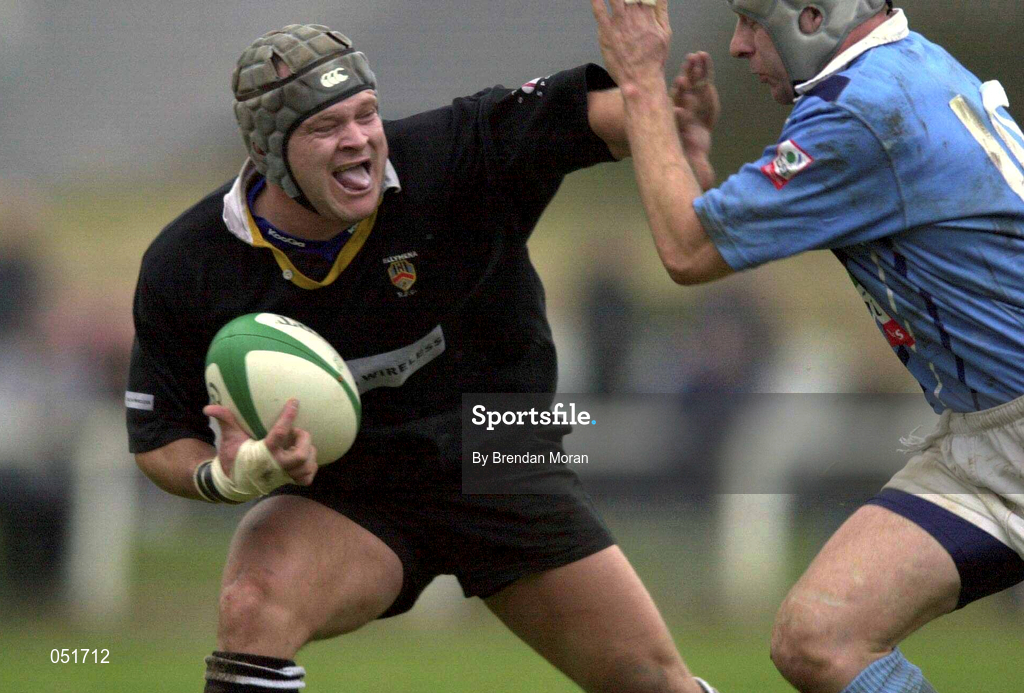 23 December 2000; Rhys Botha of Ballymena holds off the challenge of Killian Keane of Garryowen during the AIB All-Ireland League Division match between Garryowen and Ballymena at Dooradoyle in Limerick. Photo by Brendan Moran/Sportsfile
