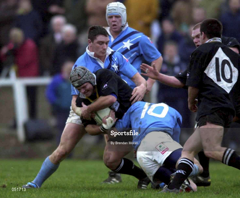 23 December 2000; Rhys Botha of Ballymena is tackled by Killian Keane, 10, and David Wallace of Garryowen during the AIB All-Ireland League Division match between Garryowen and Ballymena at Dooradoyle in Limerick. Photo by Brendan Moran/Sportsfile