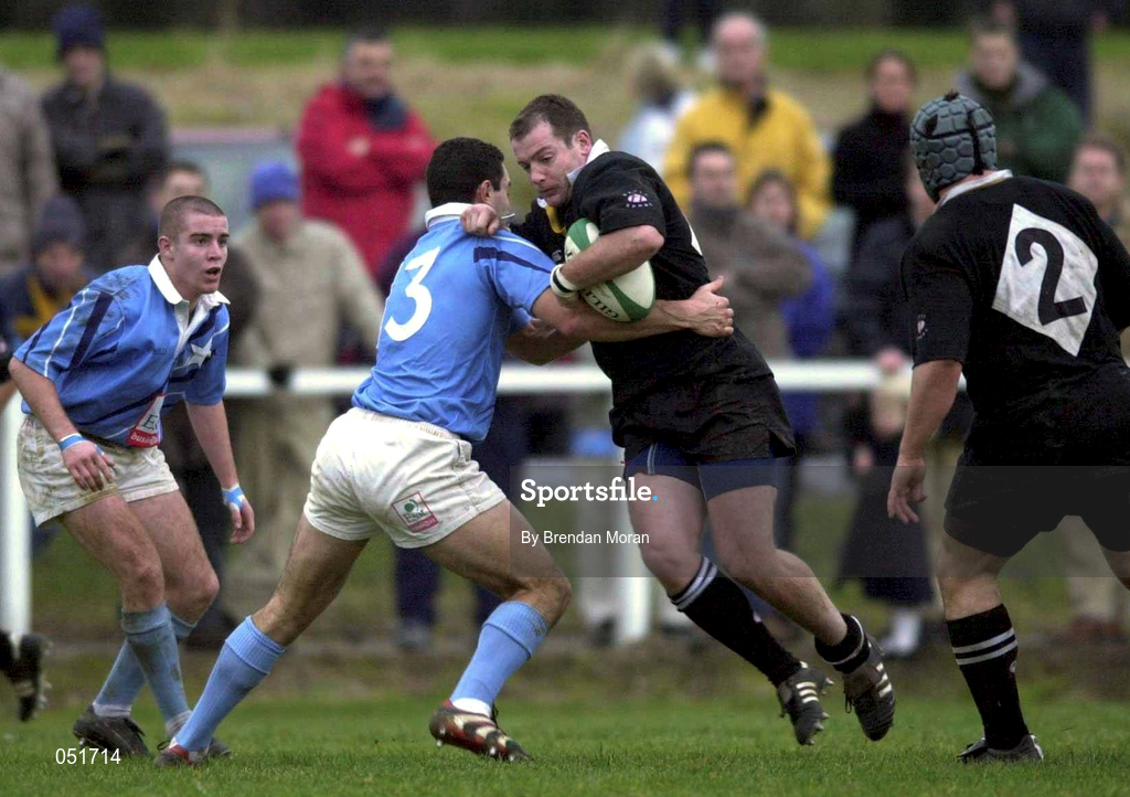 23 December 2000; James Topping of Ballymena is tackled by Jeremy Staunton of Garryowen during the AIB All-Ireland League Division match between Garryowen and Ballymena at Dooradoyle in Limerick. Photo by Brendan Moran/Sportsfile