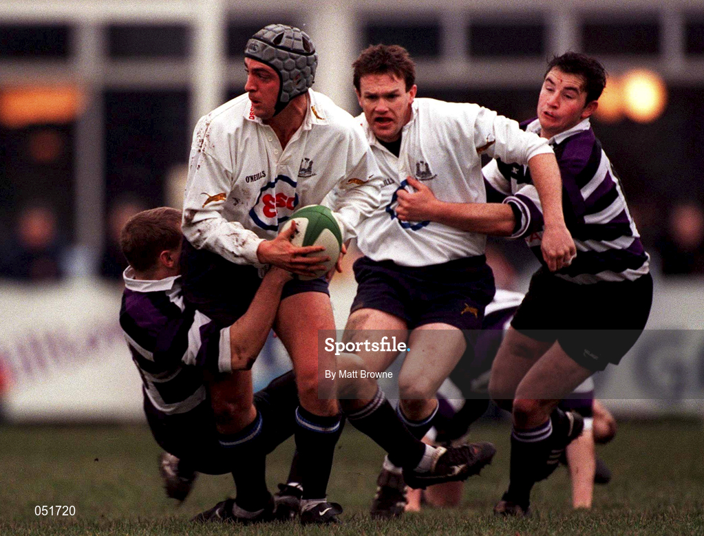 23 December 2000; Ronan O'Donavon of Cork Constitution RFC is tackled by Shane Cullen, left, of Terenure College RFC during the AIB All-Ireland League Division 2 match between Terenure College RFC and Cork Constitution RFC at Lakelands Park in Dublin. Photo by Matt Browne/Sportsfile