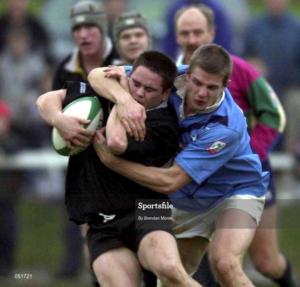 23 December 2000; Ajay Derwin of Ballymena is tackled by Fergus Costello of Garryowen during the AIB All-Ireland League Division match between Garryowen and Ballymena at Dooradoyle in Limerick. Photo by Brendan Moran/Sportsfile