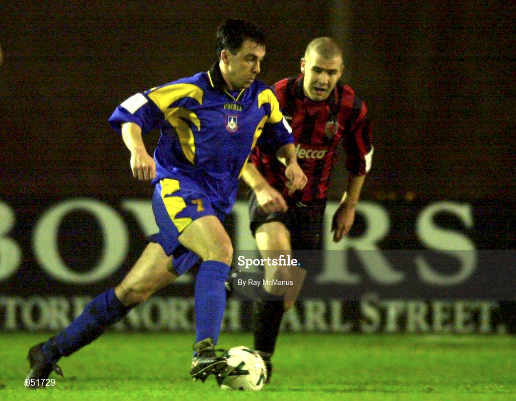 21 December 2000; Stephen Kelly of Longford Town in action against Stephen Caffrey of Bohemians during the Eircom League Premier Division match between Bohemians and Longford Town at Dalymount Park in Dublin. Photo by Ray McManus/Sportsfile