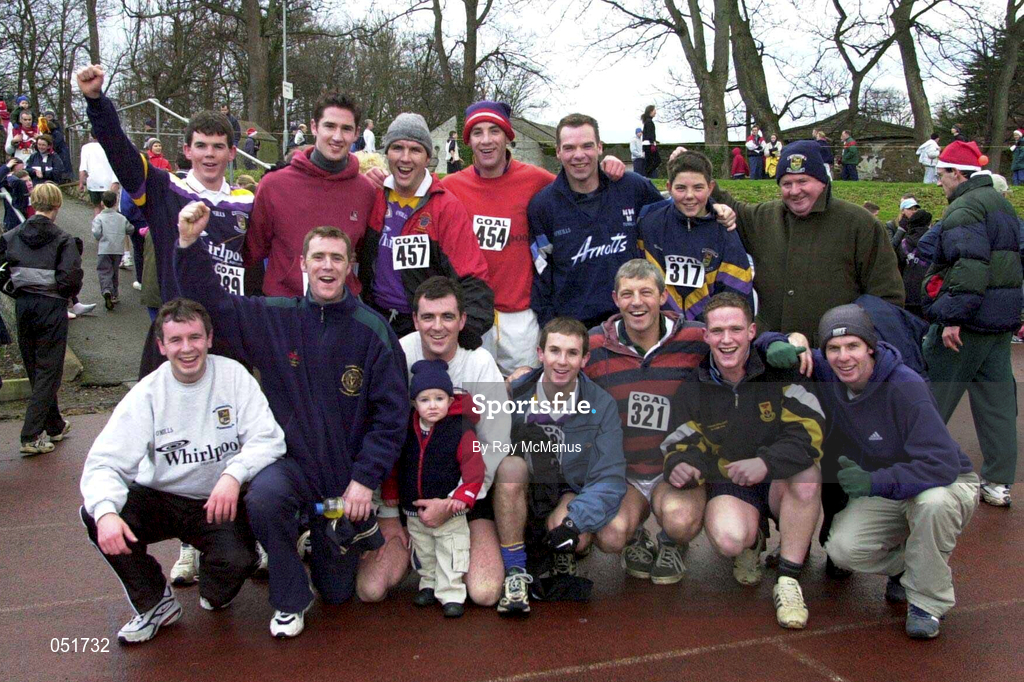 25 December 2000; Members of the Kilmacud Crokes GAA Club following the Annual Goal Mile at Belfield in Dublin. Photo by Ray McManus/Sportsfile