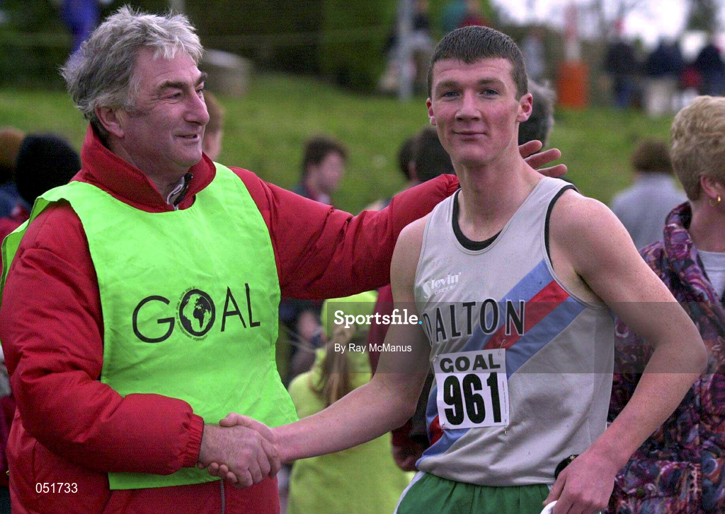 25 December 2000; Goal Director, John O'Shea, left, congratulates Peter Dalton, from Dundrum, Dublin after he had run the fastest on the day, 4.48 for the Mile, following the Annual Goal Mile at Belfield in Dublin. Photo by Ray McManus/Sportsfile