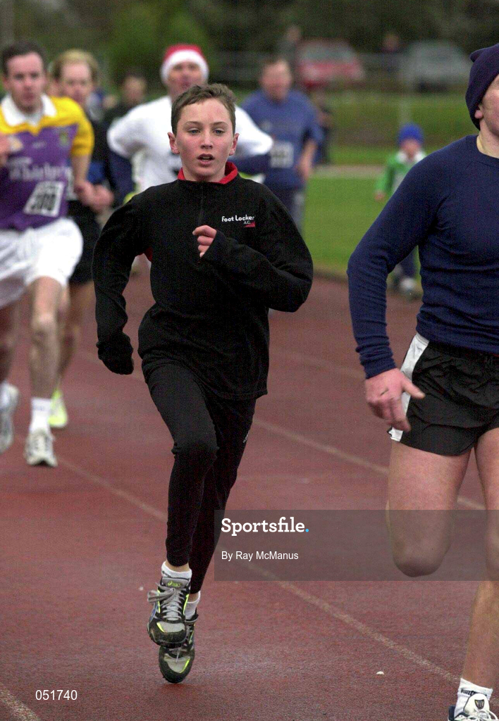 25 December 2000; John Coghlan, the son of the Former World 5000 meters champion, Eamonn, during the Annual Goal Mile at Belfield in Dublin. Photo by Ray McManus/Sportsfile
