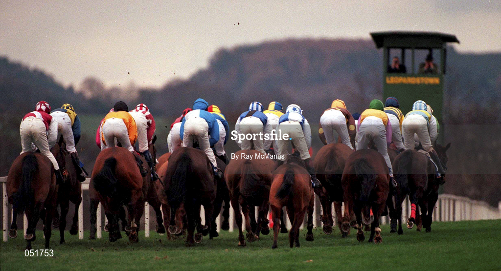26 December 2000; The eventual winner Secret Native, extreme left, with Tom Casey up, trails the field as they pass the main stand, first time round, in The Move Over-Butter Handicap Hurdle during day one of the Christmas Festival at Leopardstown Racecourse in Dublin. Photo by Ray McManus/Sportsfile