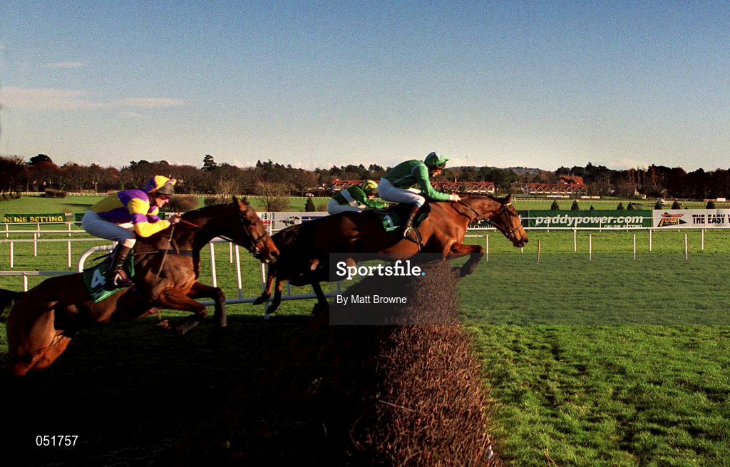 27 December 2000; Papillon, with Ruby Walsh up, leads the field first time round, ahead of eventual second, To Your Honour, with Barry Geraghty up, and third place, 4, Miles Byrne, with John Cullen up, on his way to winning the Paddy Power Dial-A-Bet Steeplechase during day two of the Christmas Festival at Leopardstown Racecourse in Dublin. Photo by Matt Browne/Sportsfile