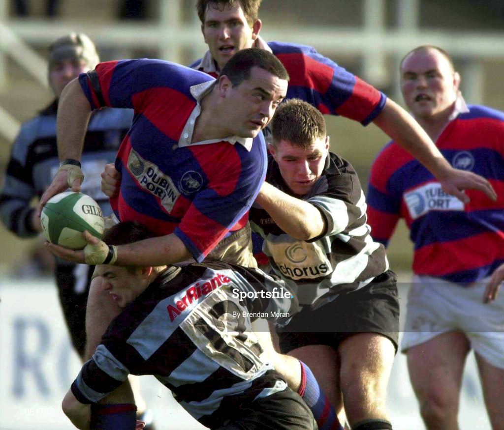 31 December 2000; Dave Moore of Clontarf is tackled by Maurice Lawlor, 12, and Frank Roche of Shannon during the AIB All-Ireland League Division 1 match between Shannon and Clontarf at Thonond Park in Limerick. Photo by Brendan Moran/Sportsfile