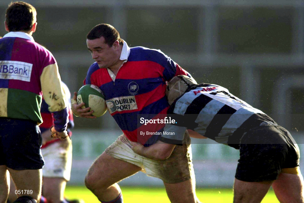 31 December 2000; Dave Moore of Clontarf holds off the challenge of David Quinlan of Shannon during the AIB All-Ireland League Division 1 match between Shannon and Clontarf at Thonond Park in Limerick. Photo by Brendan Moran/Sportsfile
