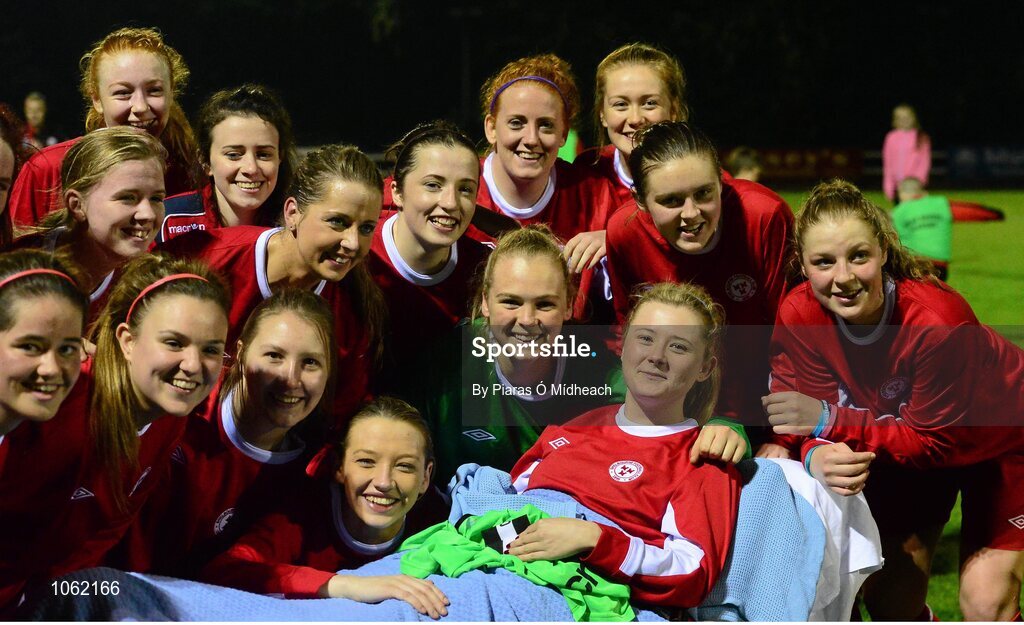 30 September 2015; Shelbourne U18 LFC players gather around their captain Caolan Lynch Carroll as she lies on an ambulance trolley after picking up an injury during the first half. FAI Umbro Women’s Intermediate Cup Final, St Catherine’s LFC v Shelbourne U18 LFC. Frank Cooke Park, Glasnevin, Dublin. Picture credit: Piaras Ó Mídheach / SPORTSFILE