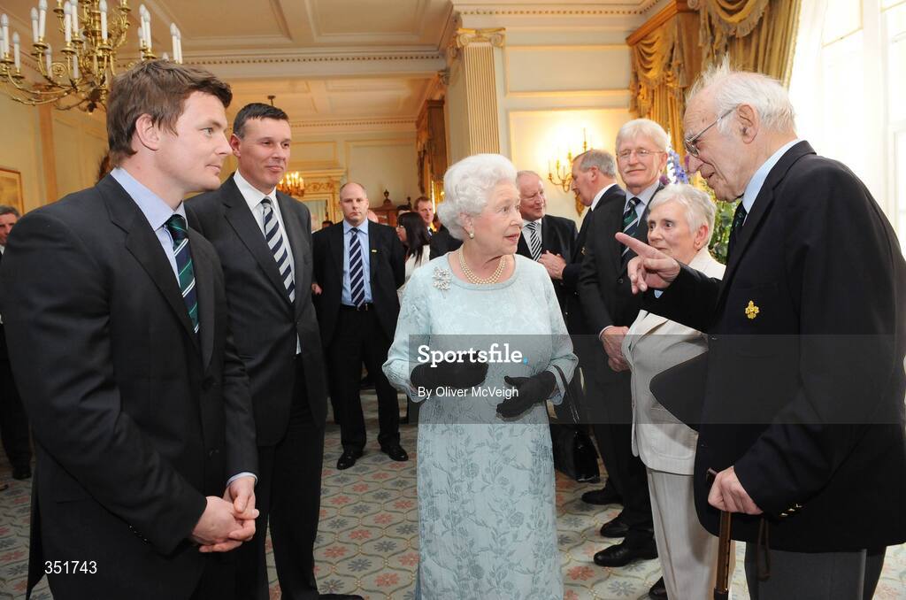 7 May 2009; Her Majesty the Queen is introduced to 1948 Ireland Grand Slam team member Jimmy Nelson, in the company of 2009 team captain Brian O'Driscoll and Philip Browne, Chief Executive of the IRFU, during a Civic Reception for the Ireland rugby squad. Hillsborough Castle, Hillsborough, Co. Down. Picture credit: Oliver McVeigh / SPORTSFILE