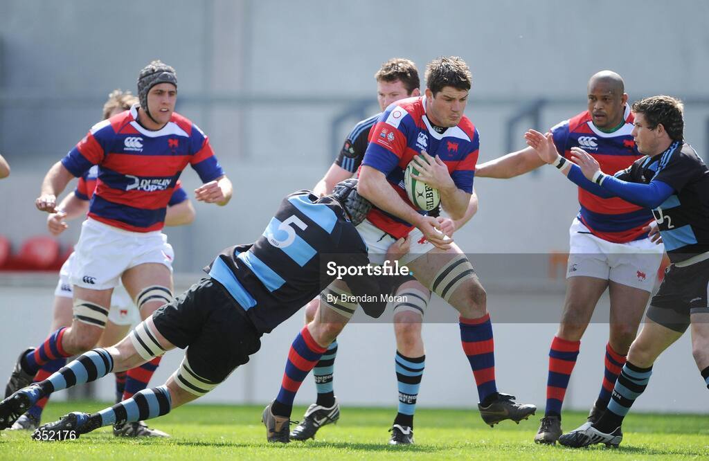 9 May 2009; Simon Crawford, Clontarf, is tackled by David O'Donovan, 15, and Tadhg Bennett, Shannon. AIB League Division 1 Final, Shannon v Clontarf, Thomond Park, Limerick. Picture credit: Brendan Moran / SPORTSFILE