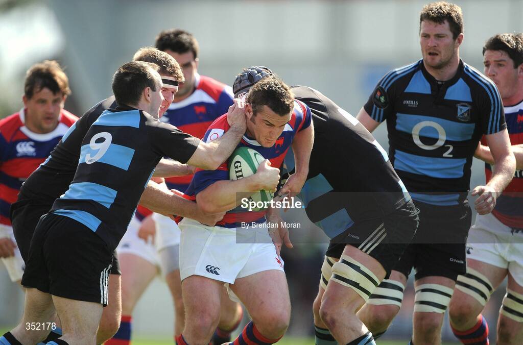 9 May 2009; Aaron Dundon, Clontarf, is tackled by Frankie Roche, left, Kevin Griffin and Fergal Walsh, Shannon. AIB League Division 1 Final, Shannon v Clontarf, Thomond Park, Limerick. Picture credit: Brendan Moran / SPORTSFILE