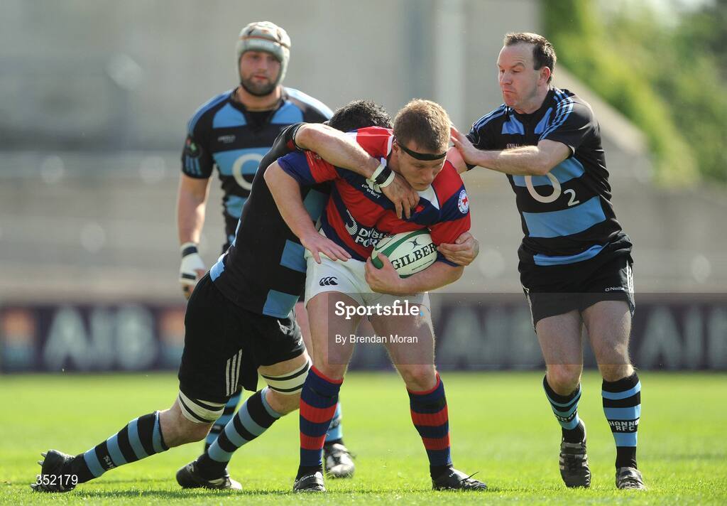 9 May 2009; Niall Carson, Clontarf, is tackled by Padraic O'Brien, left, and Frankie Roche, Shannon. AIB League Division 1 Final, Shannon v Clontarf, Thomond Park, Limerick. Picture credit: Brendan Moran / SPORTSFILE