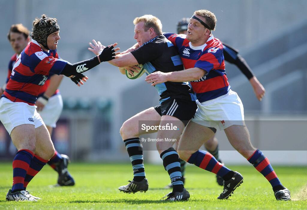 9 May 2009; Stephen Kelly, Shannon, is tackled by Aaron Dundon, left, and Niall Carson, Clontarf. AIB League Division 1 Final, Shannon v Clontarf, Thomond Park, Limerick. Picture credit: Brendan Moran / SPORTSFILE