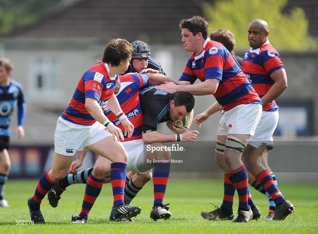 9 May 2009; Padraic O'Brien, Shannon, is tackled by Martin Garvey and Simon Crawford, Clontarf. AIB League Division 1 Final, Shannon v Clontarf, Thomond Park, Limerick. Picture credit: Brendan Moran / SPORTSFILE