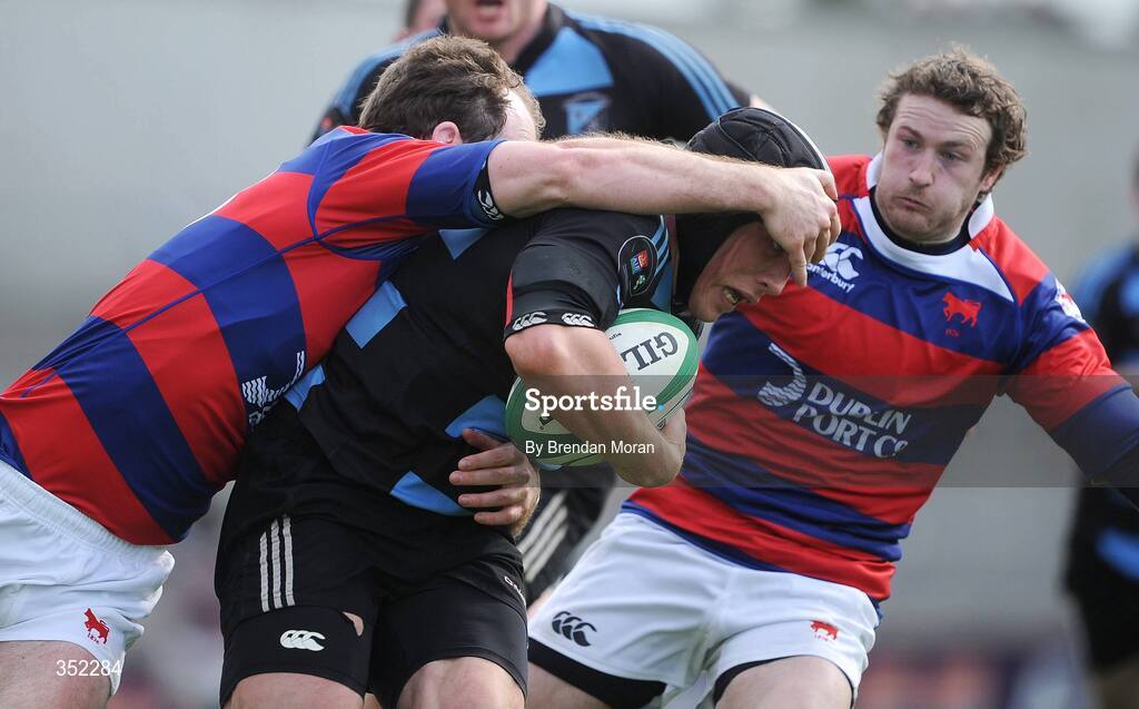 9 May 2009; Eoghan Grace, Shannon, is tackled by Daragh O'Shea, left, and Phil Howard, Clontarf. AIB League Division 1 Final, Shannon v Clontarf, Thomond Park, Limerick. Picture credit: Brendan Moran / SPORTSFILE