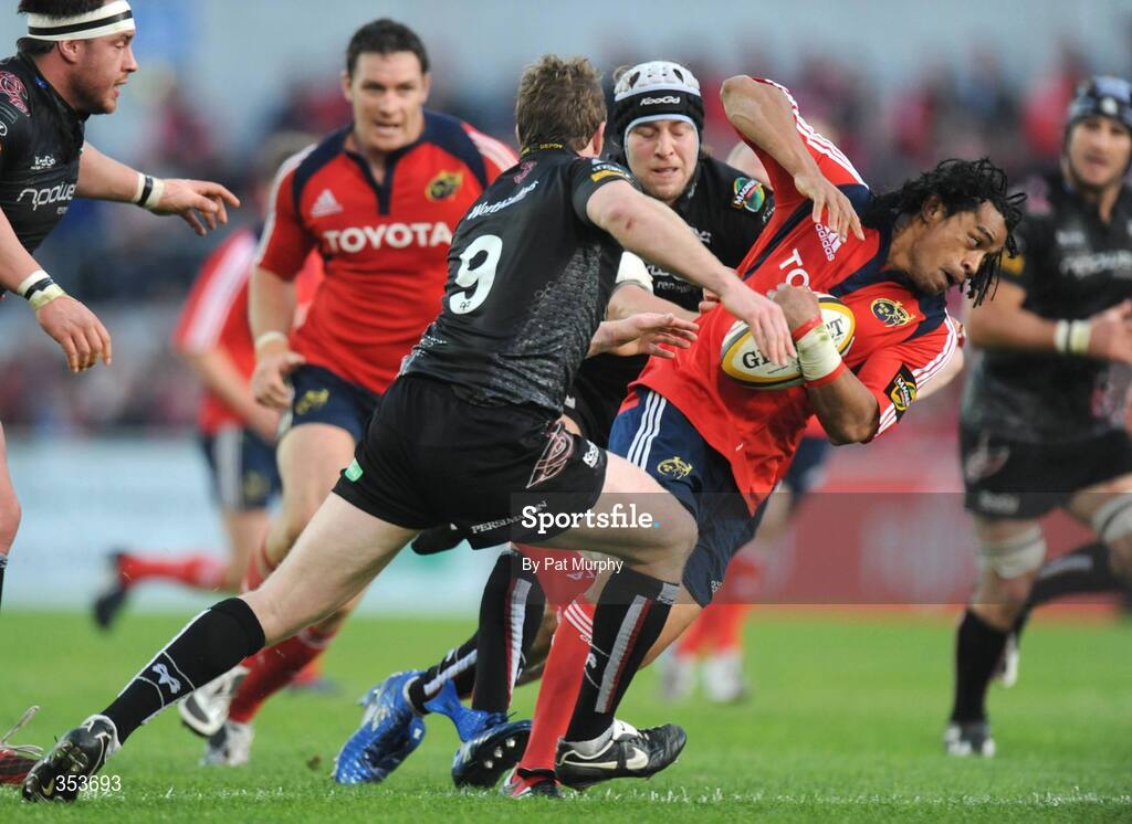 15 May 2009; Lifeimi Mafi, Munster, is tackled by Jamie Nutbrown, 9, and Ryan Jones, Ospreys. Magners League, Munster v Neath Swansea Ospreys, Thomond Park, Limerick. Picture credit: Pat Murphy / SPORTSFILE