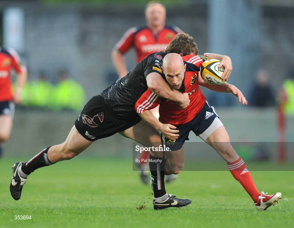 15 May 2009; Peter Stringer, Munster, is tackled by Jamie Nutbrown, Ospreys. Magners League, Munster v Neath Swansea Ospreys, Thomond Park, Limerick. Picture credit: Pat Murphy / SPORTSFILE
