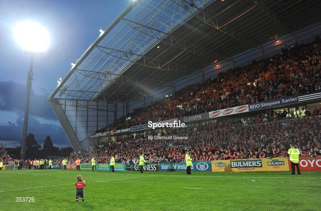 15 May 2009; Bernardo Pucciariello, son of Federico, watched by supporters and stewards, celebrates on the pitch after the game. Magners League, Munster v Neath Swansea Ospreys, Thomond Park, Limerick.  Picture credit: Diarmuid Greene / SPORTSFILE