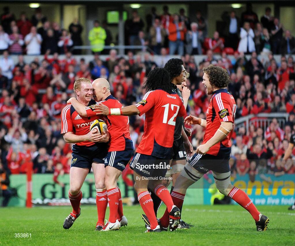 15 May 2009; Anthony Horgan, Munster, is congratulated by team-mates Peter Stringer, Lifeimi Mafi, no.12, and John O'Sullivan, right, after scoring his side's fifth try of the game and final try of the season. Magners League, Munster v Neath Swansea Ospreys, Thomond Park, Limerick.  Picture credit: Diarmuid Greene / SPORTSFILE