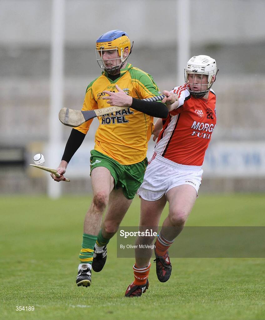 17 May 2009; Enda McDermott, Donegal, in action against Nathan Curry, Armagh. Ulster Senior Hurling Championship, Second Round, Donegal v Armagh, Letterkenny, Co. Donegal. Picture credit: Oliver McVeigh / SPORTSFILE