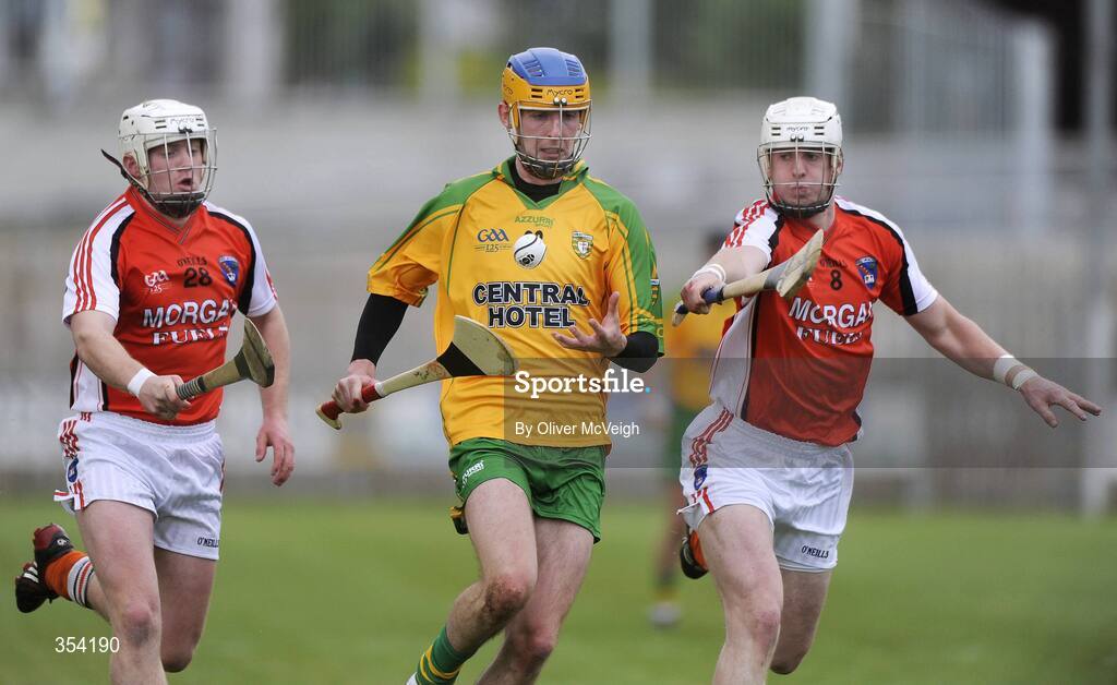 17 May 2009; Enda McDermott, Donegal, in action against Nathan Curry and Eugene McDonnell, Armagh. Ulster Senior Hurling Championship, Second Round, Donegal v Armagh, Letterkenny, Co. Donegal. Picture credit: Oliver McVeigh / SPORTSFILE