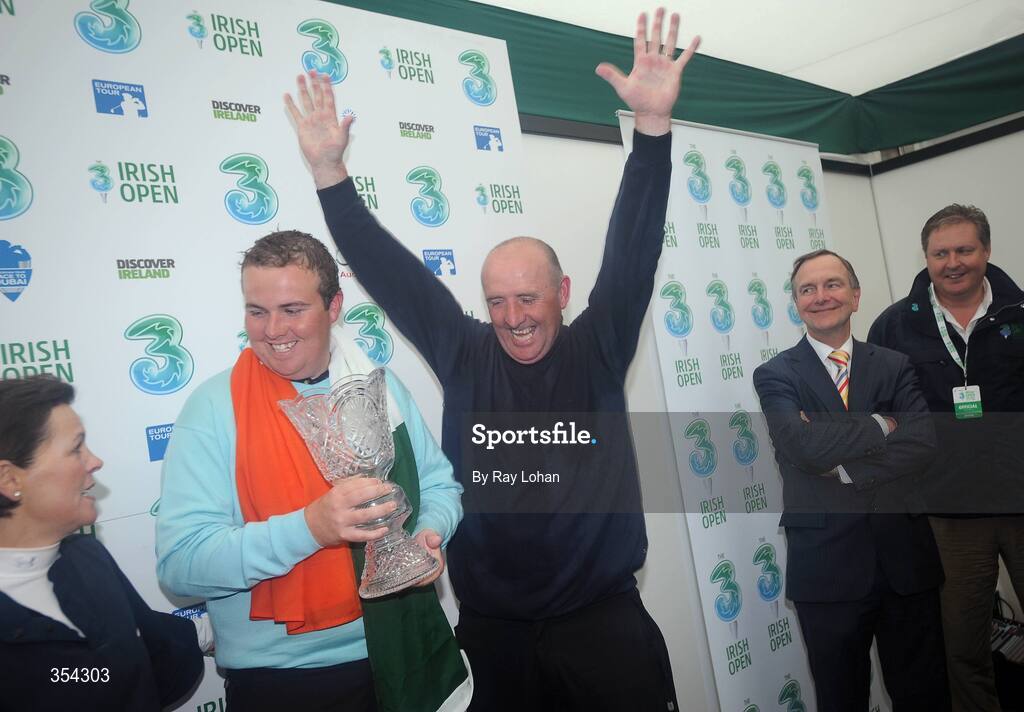 17 May 2009; Shane Lowry, centre, celebrates with his mother Bridget, left, and father Brendan as Minister for Arts, Sport and Tourism, Martin Cullen T.D looks on. 3 Irish Open Golf Championship. County Louth Golf Club, Baltray, Co. Louth. Picture credit: Ray Lohan / SPORTSFILE
