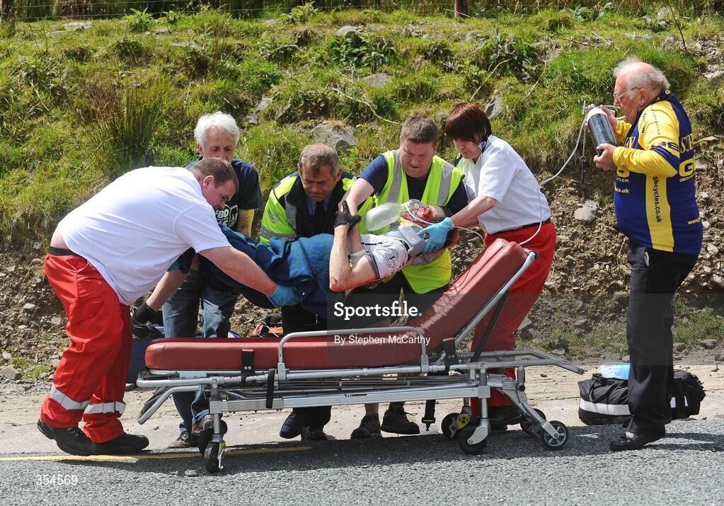 20 May 2009; John Veness, Surrey Racing League, is lifted onto a stretcher after crashing on the descent of the Conor Pass climb. FBD Insurance Ras 2009, Stage 4, Cahirciveen to Killorglin. Picture credit: Stephen McCarthy / SPORTSFILE