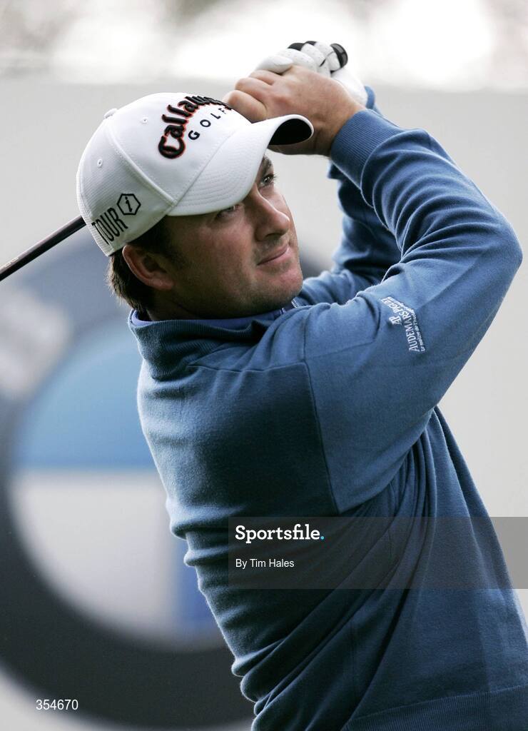 21 May 2009; Northern Ireland's Graeme McDowell tees off during round 1 of the BMW PGA Championship. Wentworth Golf Club, Virginia Water, Surrey, England. Picture credit: Tim Hales / SPORTSFILE