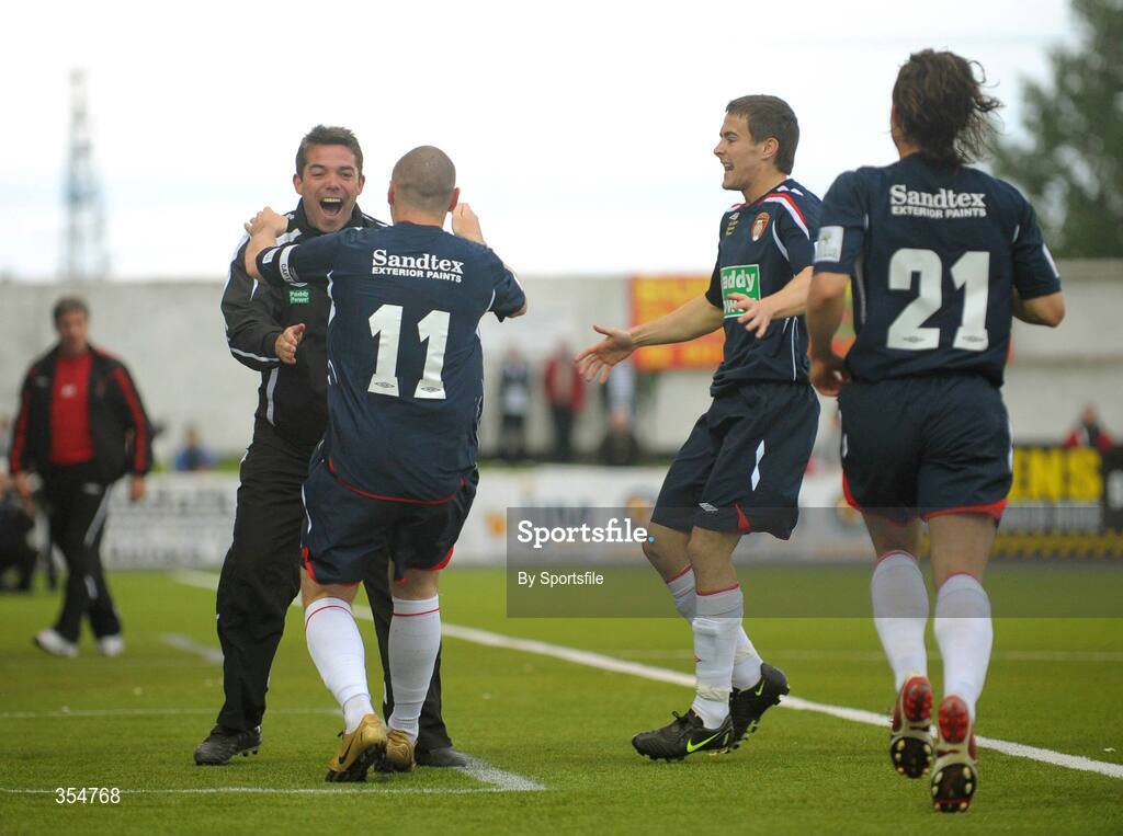 22 May 2009; Mark Quigley, 11, St Patrick's Athletic, goes to celebrate with manager Jeff Kenna after scoring his side's first goal. League of Ireland Premier Division, Dundalk v St Patrick's Athletic, Oriel Park, Dundalk. Photo by Sportsfile