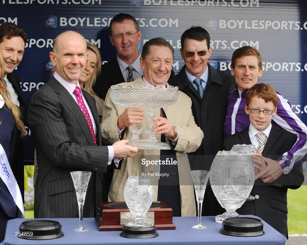 23 May 2009; Winning connections including Aidan O'Brien, trainer, Johnny Murtagh, jockey and Derrick Smith, owner, are presented with the trophies by John Boyle, Managing Director of Boylesports after Mastercraftsman won the Boylesports.com Irish 2,000 Guineas. Boylesports.com Irish Guineas Festival 2009, Curragh Racecourse, Co. Kildare. Picture credit: Pat Murphy / SPORTSFILE