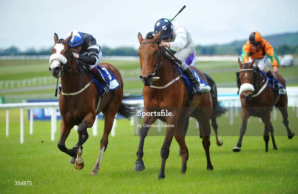 23 May 2009; Emily Blake, with Johnny Murtagh up, on their way to winning the Tri Equestrian Stakes, from Beach Bunny, no.3, with Christopher Hayes up. Boylesports.com Irish Guineas Festival. Curragh Racecourse, Co. Kildare. Picture credit: Diarmuid Greene / SPORTSFILE