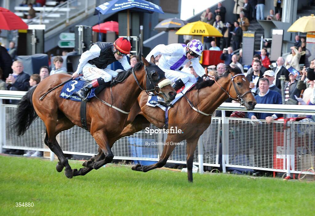 23 May 2009; Coolcullen Times with Kevin Manning up, right, on their way to winning the Boylesports Fon-A-Bet 1800 44 00 00 Handicap from Designated Decoy, with Patrick Smullen up. Boylesports.com Irish Guineas Festival. Curragh Racecourse, Co. Kildare. Picture credit: Diarmuid Greene / SPORTSFILE