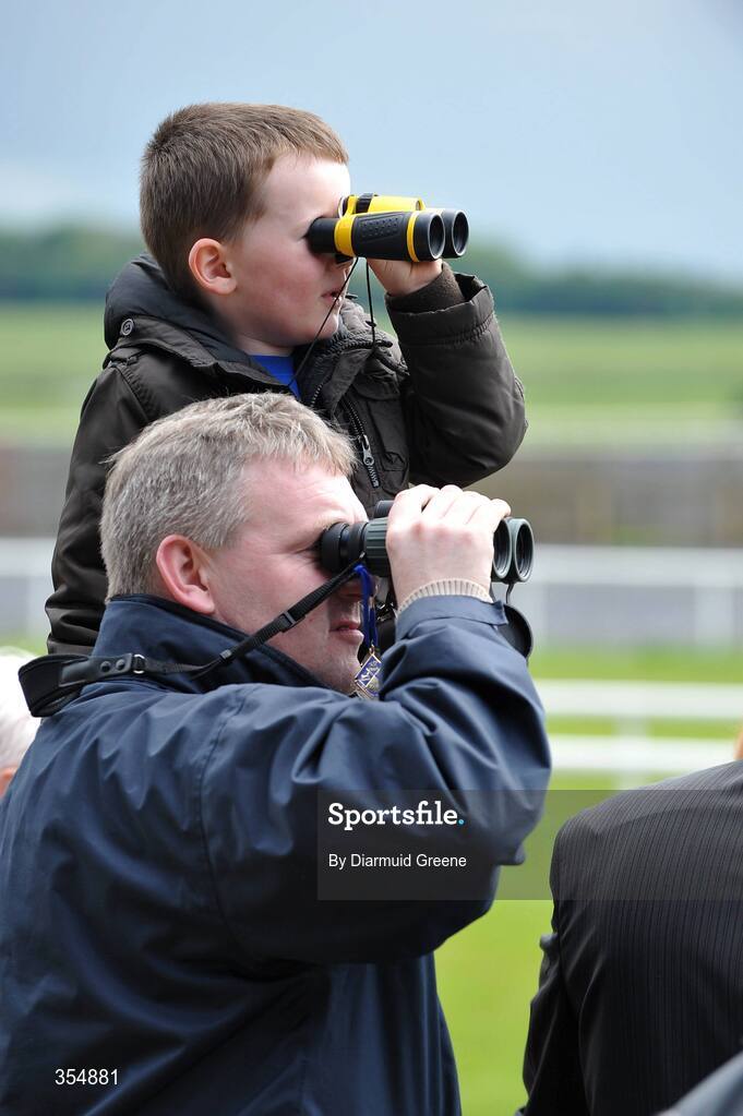 23 May 2009; Four-year-old Cian Reilly with his dad John from Kildangan, Co. Kildare, watch on during the days racing. Boylesports.com Irish Guineas Festival. Curragh Racecourse, Co. Kildare. Picture credit: Diarmuid Greene / SPORTSFILE