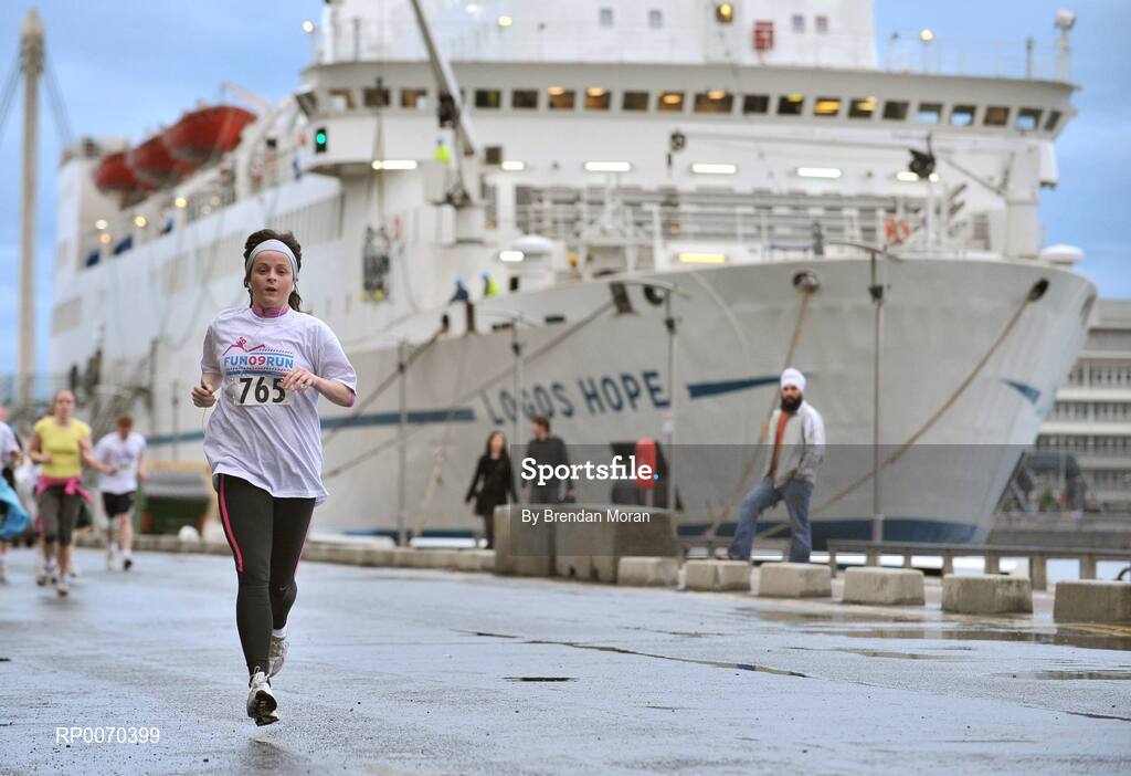 19 May 2009; Close to 2,500 walkers, joggers and runners of all abilities took part in the annual Docklands Fun Run this evening. An estimated €12,000 was raised for designated charity, Irish Autism Action. The first man over the finish line was Paul O'Connell, from Dublin, who completed the 8km run in 25 minutes and 51 seconds. Caitriona Jennings was the first woman home, in a time of 30 minutes and 02 seconds. Docklands Grand Canal Square, Dublin. Picture credit: Brendan Moran / SPORTSFILE