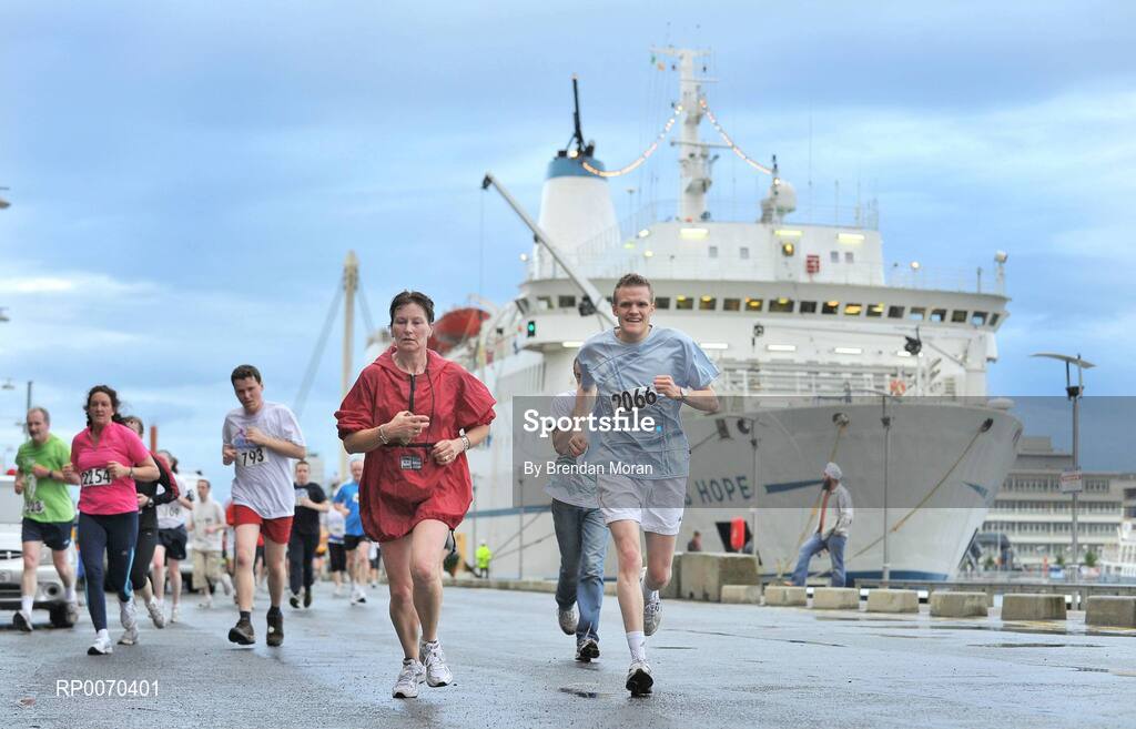 19 May 2009; Close to 2,500 walkers, joggers and runners of all abilities took part in the annual Docklands Fun Run this evening. An estimated €12,000 was raised for designated charity, Irish Autism Action. The first man over the finish line was Paul O'Connell, from Dublin, who completed the 8km run in 25 minutes and 51 seconds. Caitriona Jennings was the first woman home, in a time of 30 minutes and 02 seconds. Docklands Grand Canal Square, Dublin. Picture credit: Brendan Moran / SPORTSFILE