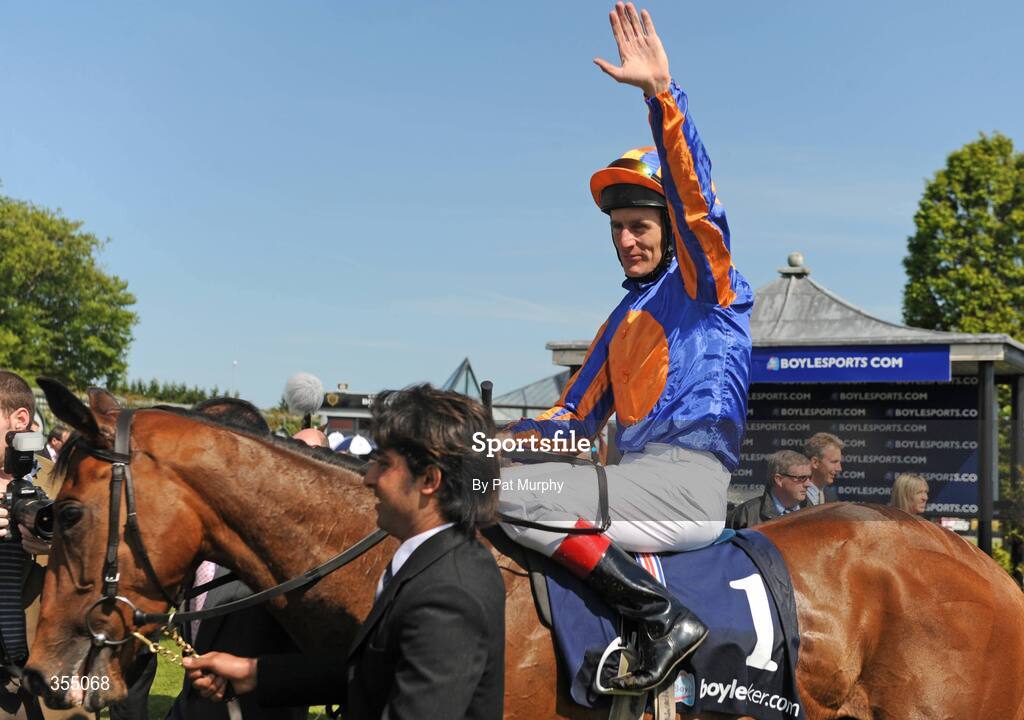 24 May 2009; Jockey Johnny Murtagh celebrates after victory in the Boylesports.com Irish 1,000 Guineas on Again. Boylesports.com Irish Guineas Festival 2009, Curragh Racecourse, Co. Kildare. Picture credit: Pat Murphy / SPORTSFILE
