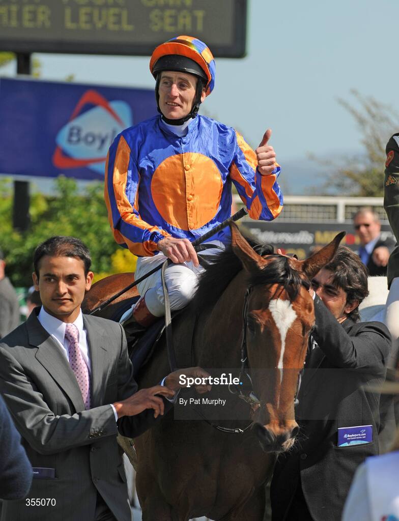 24 May 2009; Jockey Johnny Murtagh celebrates after victory in the Boylesports.com Irish 1,000 Guineas on Again. Boylesports.com Irish Guineas Festival 2009, Curragh Racecourse, Co. Kildare. Picture credit: Pat Murphy / SPORTSFILE
