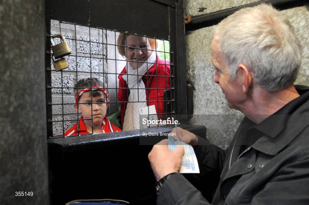 24 May 2009; Steward Harry Boyle from Lavey, Co. Derry, tears the tickets of Teresa McNally from Draperstown and her grandson Oisín Grimes, aged 7, from Magherfelt, before the game. Ulster GAA Football Senior Championship Quarter-Final, Derry v Monaghan, Celtic Park, Derry. Picture credit: Daire Brennan / SPORTSFILE
