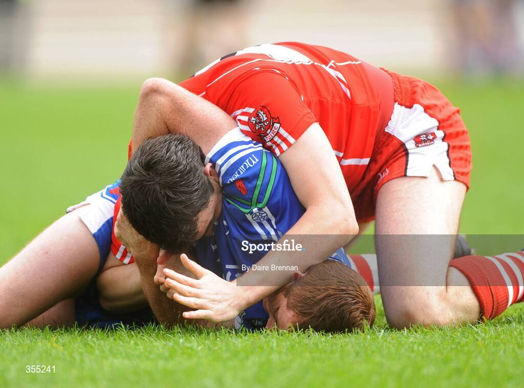 24 May 2009; Kevin McGuckin, Derry, tussles with Tomas Freeman, Monaghan, during the game. Ulster GAA Football Senior Championship Quarter-Final, Derry v Monaghan, Celtic Park, Derry. Picture credit: Daire Brennan / SPORTSFILE