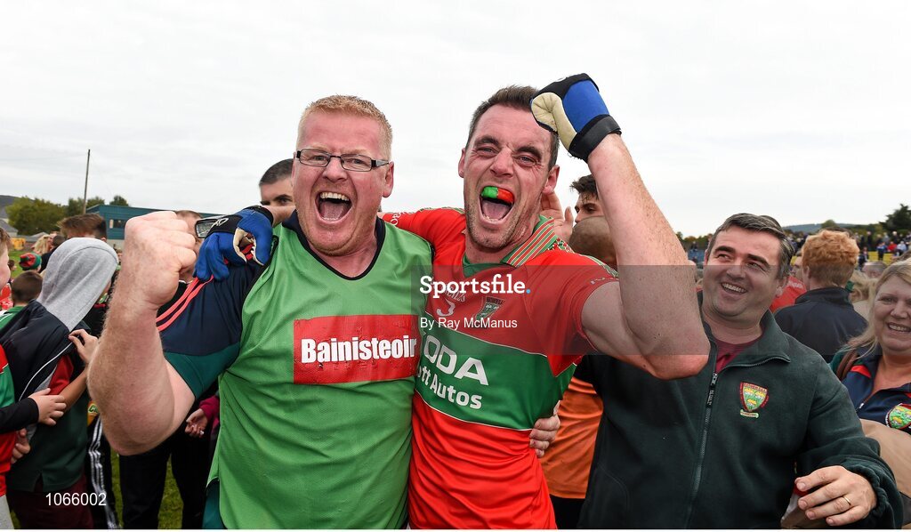 11 October 2015; The Rathnew manager Declan Byrne and full back Damien Power celebrate after the game. Renault Ireland Wicklow County Senior Football Championship Final, Rathnew v St Patrick's. County Grounds, Aughrim, Co. Wicklow. Picture credit: Ray McManus / SPORTSFILE