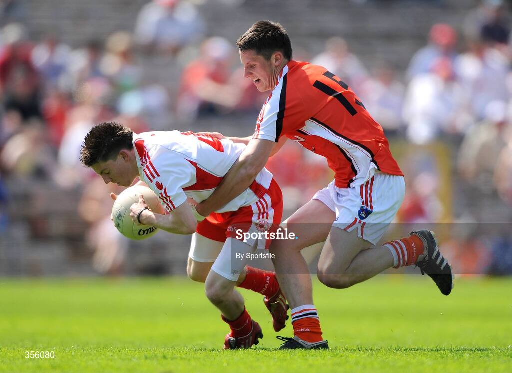 31 May 2009; Declan Connolly, Tyrone, in action against Gavin McParland, Armagh. Ulster GAA Football Minor Championship, Tyrone v Armagh, St. Tiernach's Park, Clones, Co.Monaghan. Photo by Sportsfile
