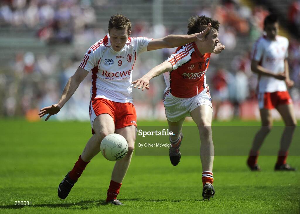 31 May 2009; Mark Faloon, Tyrone, in action against Andrew Mumin, Armagh. Ulster GAA Football Minor Championship, Tyrone v Armagh, St. Tiernach's Park, Clones, Co.Monaghan. Picture credit: Oliver McVeigh / SPORTSFILE